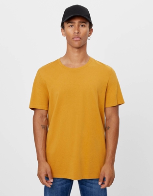 Bershka Camiseta Con Cuello Redondo Hombre M Mostaza