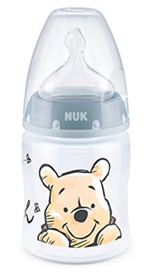 NUK First Choice+ - Biberón de Disney Winnieh the Pooh, 0 – 6 meses, Indicador de temperatura, 150 ml, Válvula anticólicos, Sin BPA, Tetina de silicon