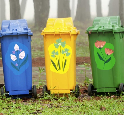 Conteneur de déchets avec sticker fleur