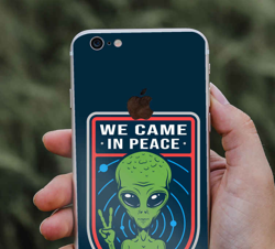 Insigne extraterrestre vintage avec texte autocollant iphone características