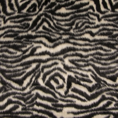 Tissu fausse fourrure peau de bête écru
