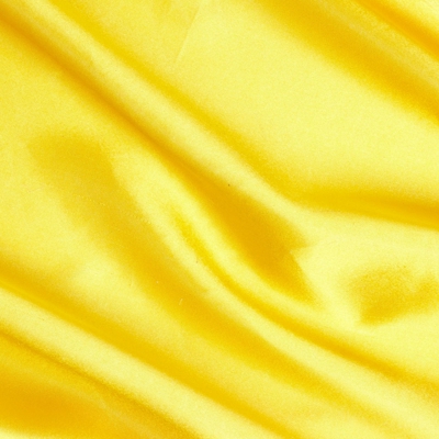Tissu satin uni jaune