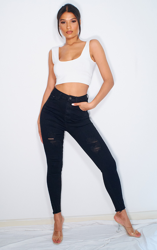 PRETTYLITTLETHING - Jean noir déchiré à ourlet élimé, Noir en oferta