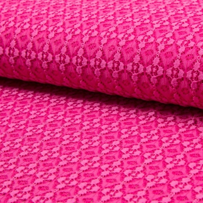 Tissu dentelle fleurs géométriques rose fuchsia
