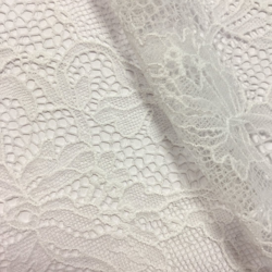 Tissu dentelle de Calais léger blanc polyamide motifs arabesques fleuries precio
