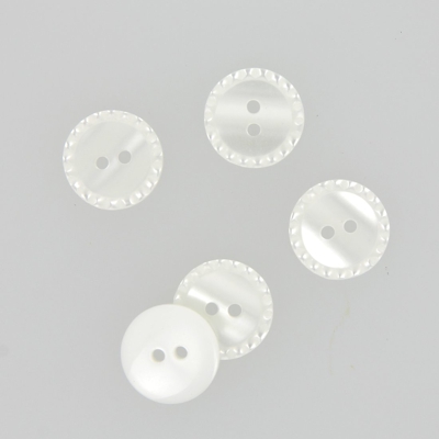 Boutons à bords pointillés blanc 18 mm
