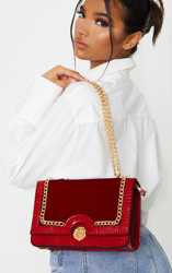 Sac à bandoulière rouge en velours à partie effet croco et tête de lion, Scarlet en oferta