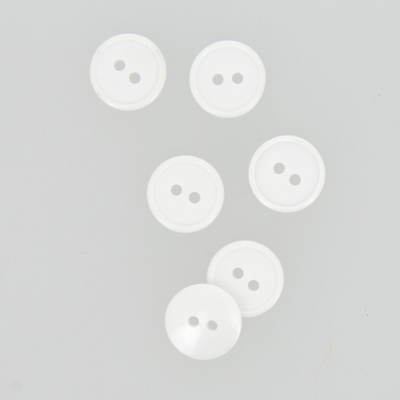 Boutons plats 2 trous blanc 15 mm