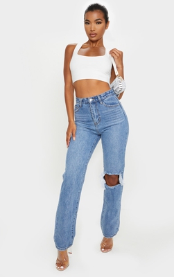 Jean droit au délavage bleu clair ouvert sur le genou, Délavage bleu clair