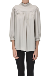 Crepè blouse características